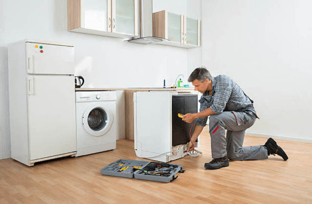 repairing a dishwasher in a home in Fall River